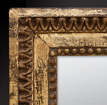 Détail miroir ancien bois dore